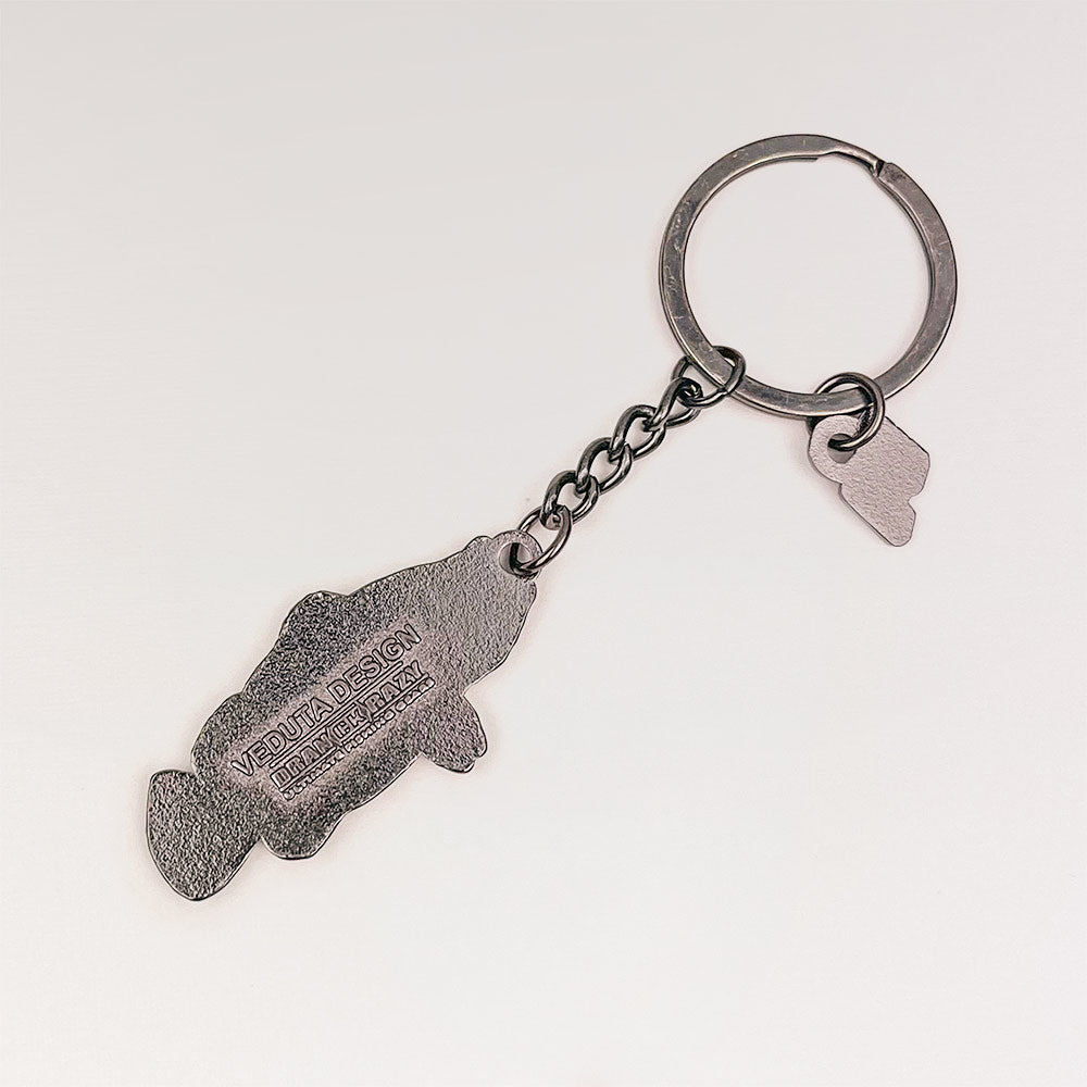 Back of the Peacock Bass keychain charm with embossed VEDUTA DESIGN — From Anglers to Anglers logo