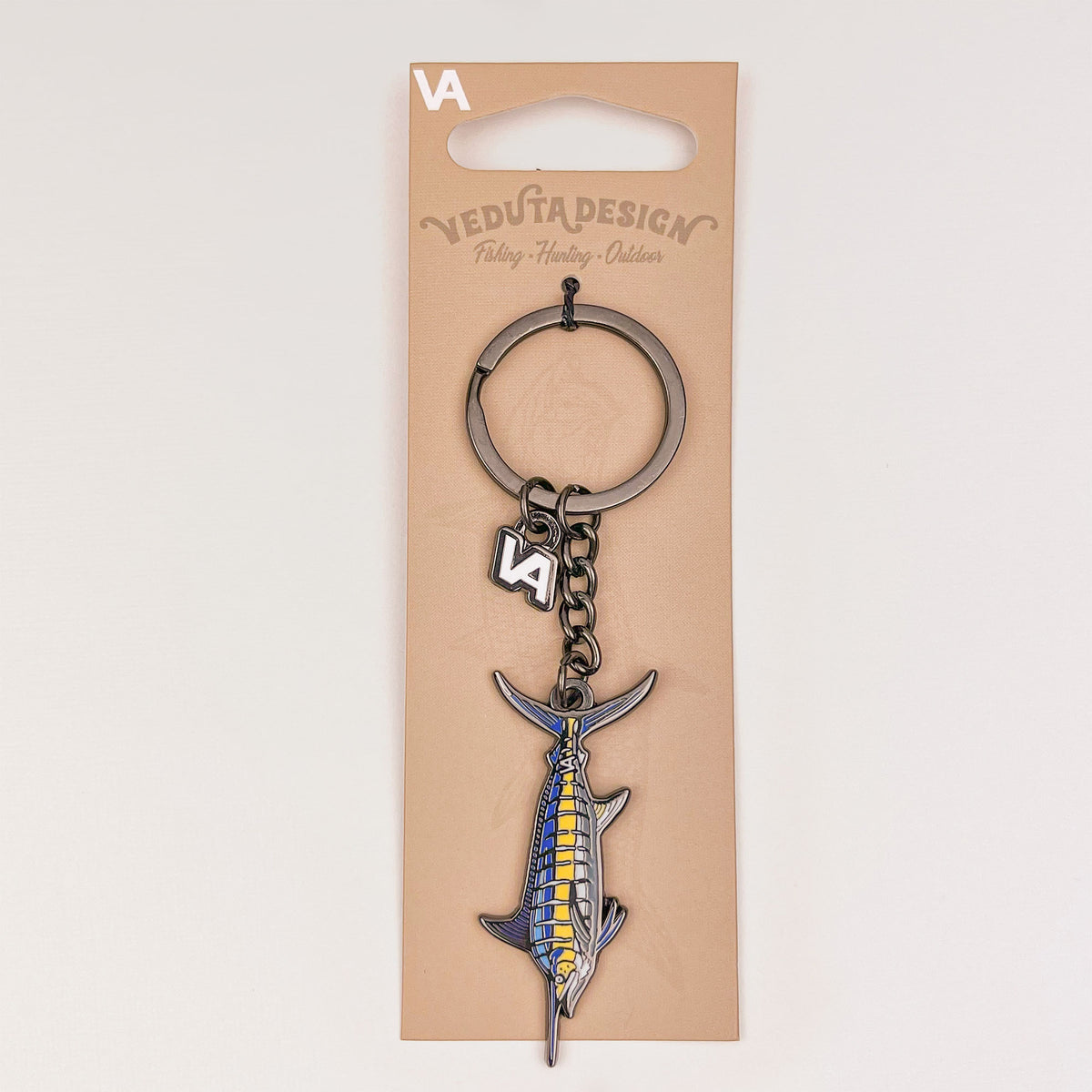 Blue Marlin keychain on branded cardboard hang-tab packaging