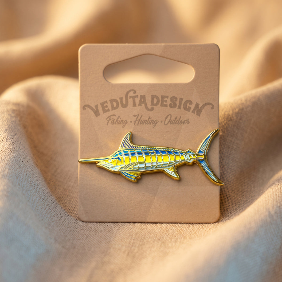 Blue Marlin pin on VEDUTA DESIGN branded backing card