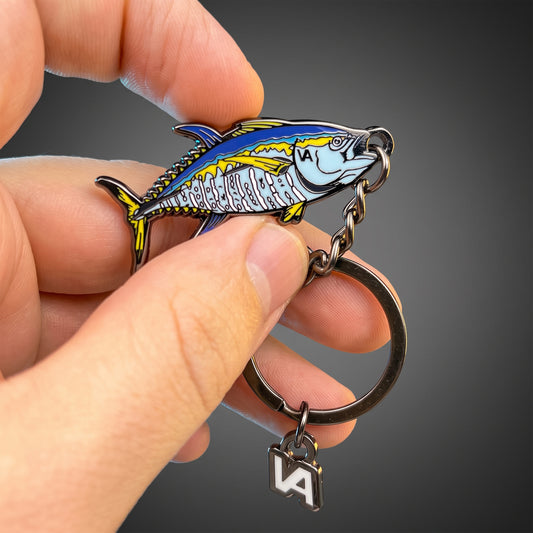 Bluefin Tuna keychain held in hand against a dark background