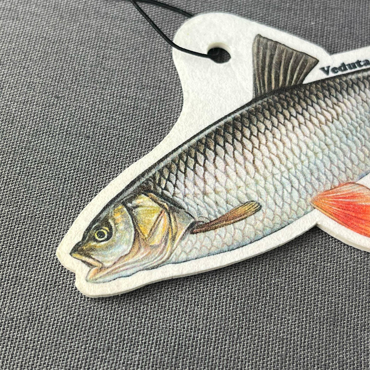Close-up of the hand-drawn Chub artwork on the air freshener