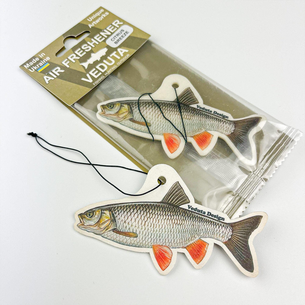 Chub air freshener next to its sealed VEDUTA DESIGN package