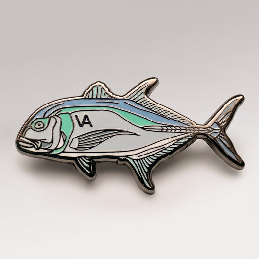 Giant Trevally pin, side profile, on a white studio background