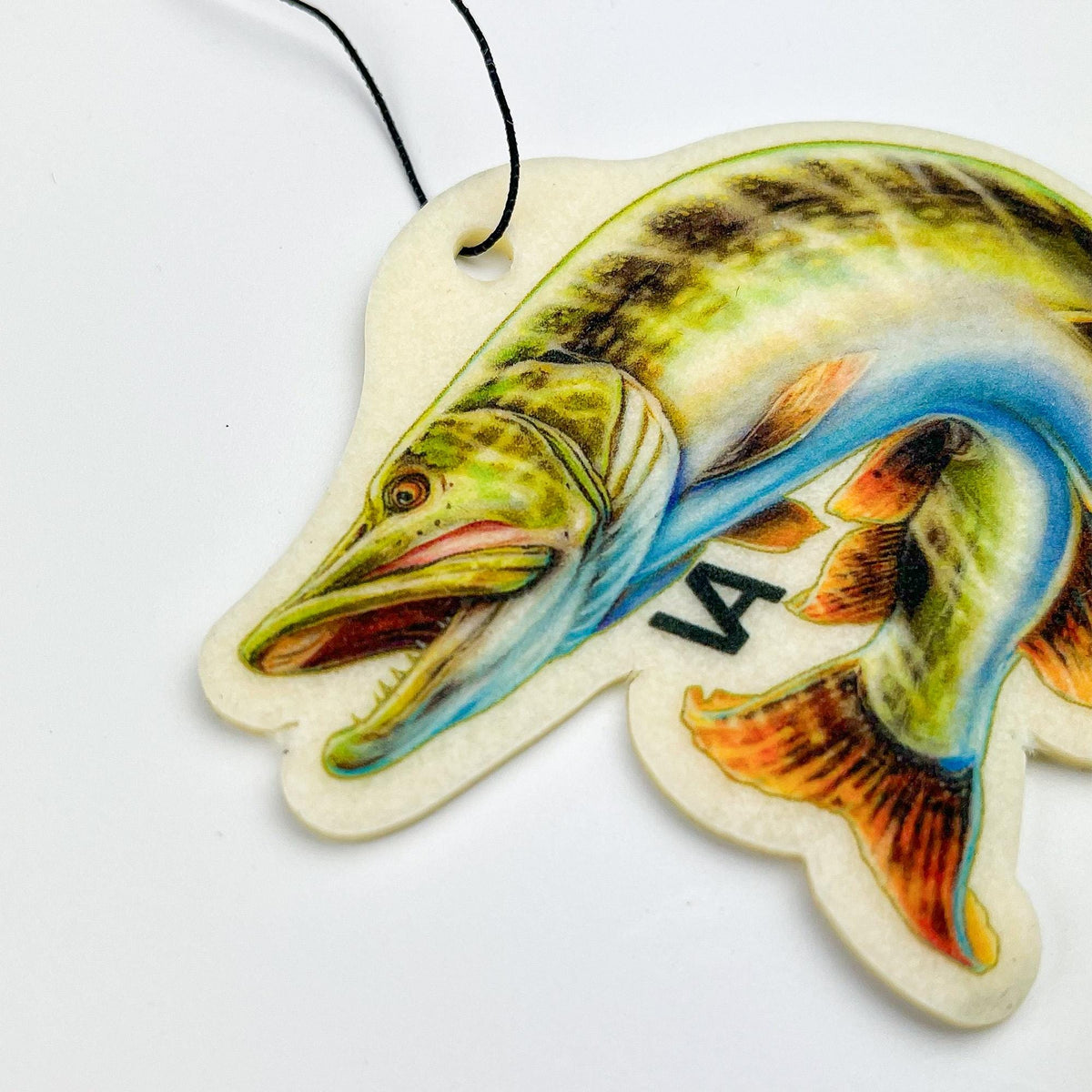Close-up of the hand-drawn Northern Pike artwork on the air freshener