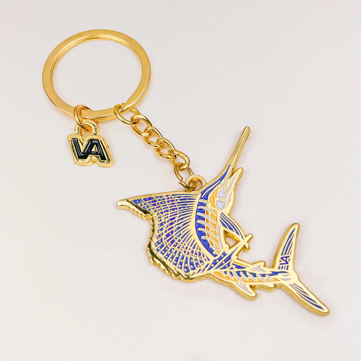 Full length of the Leaping Sailfish keychain with keyring, chain, and VEDUTA DESIGN VA logo charm