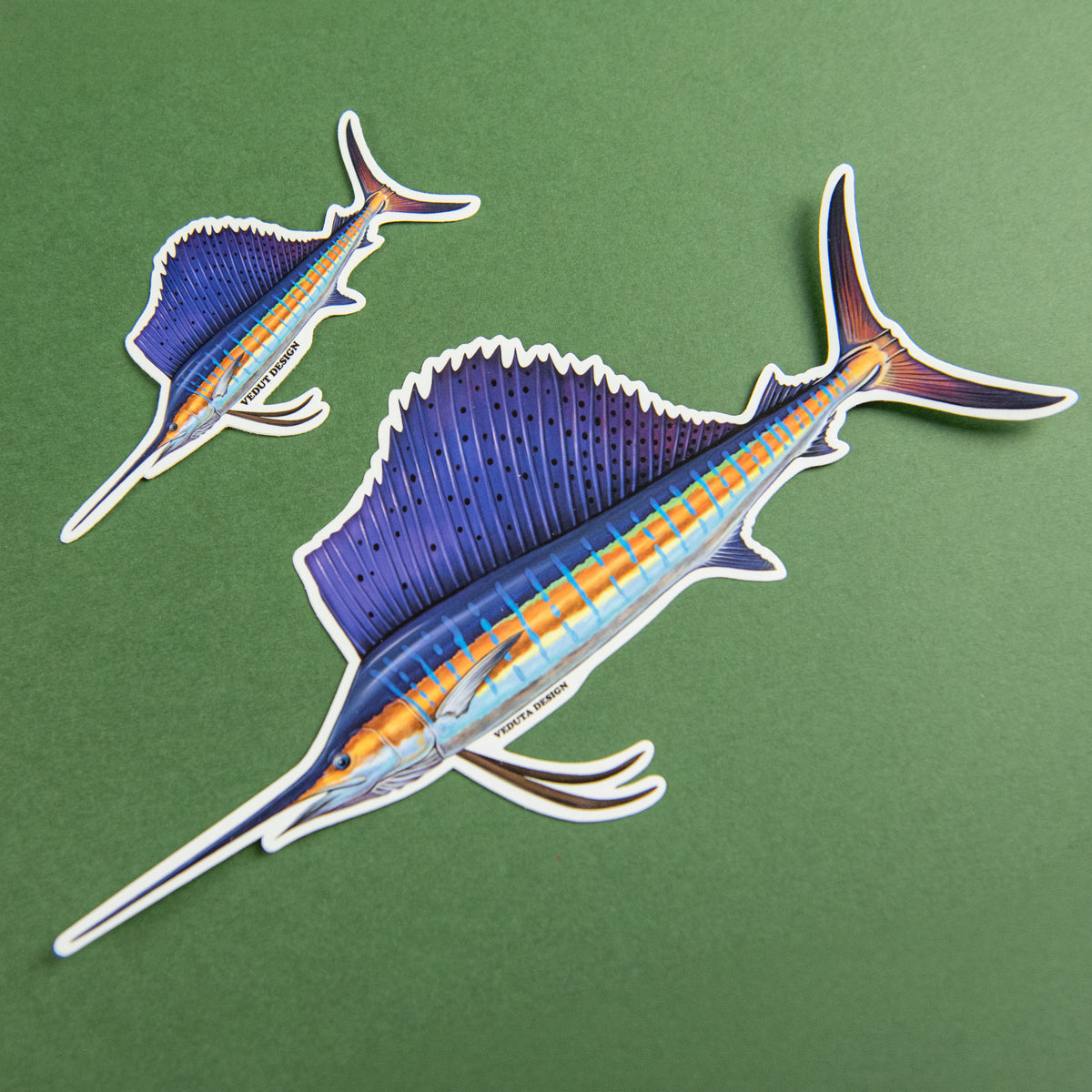 Sailfish stickers in two sizes side by side, offshore fishing decal